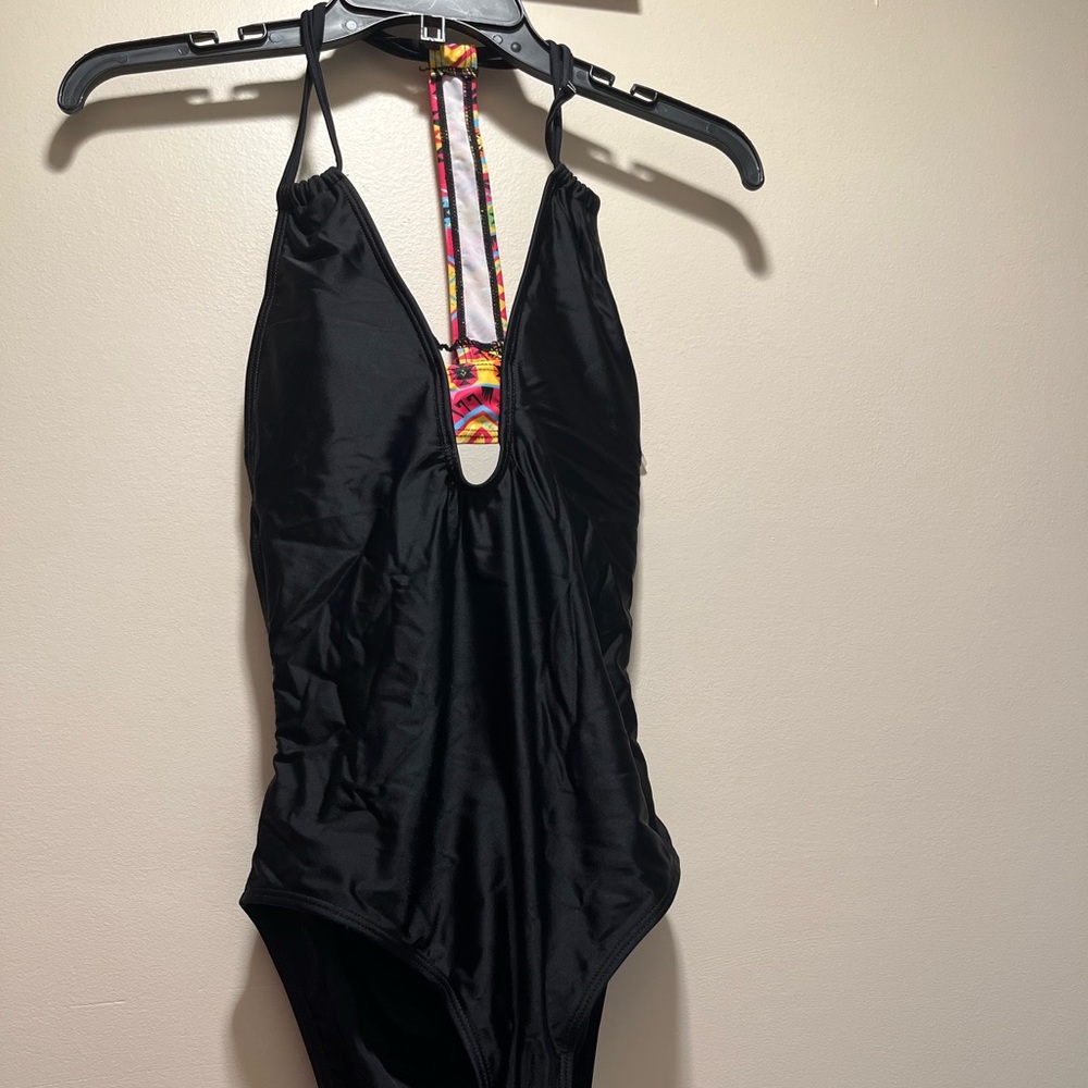 Medium black one piece bathing suit with patterns